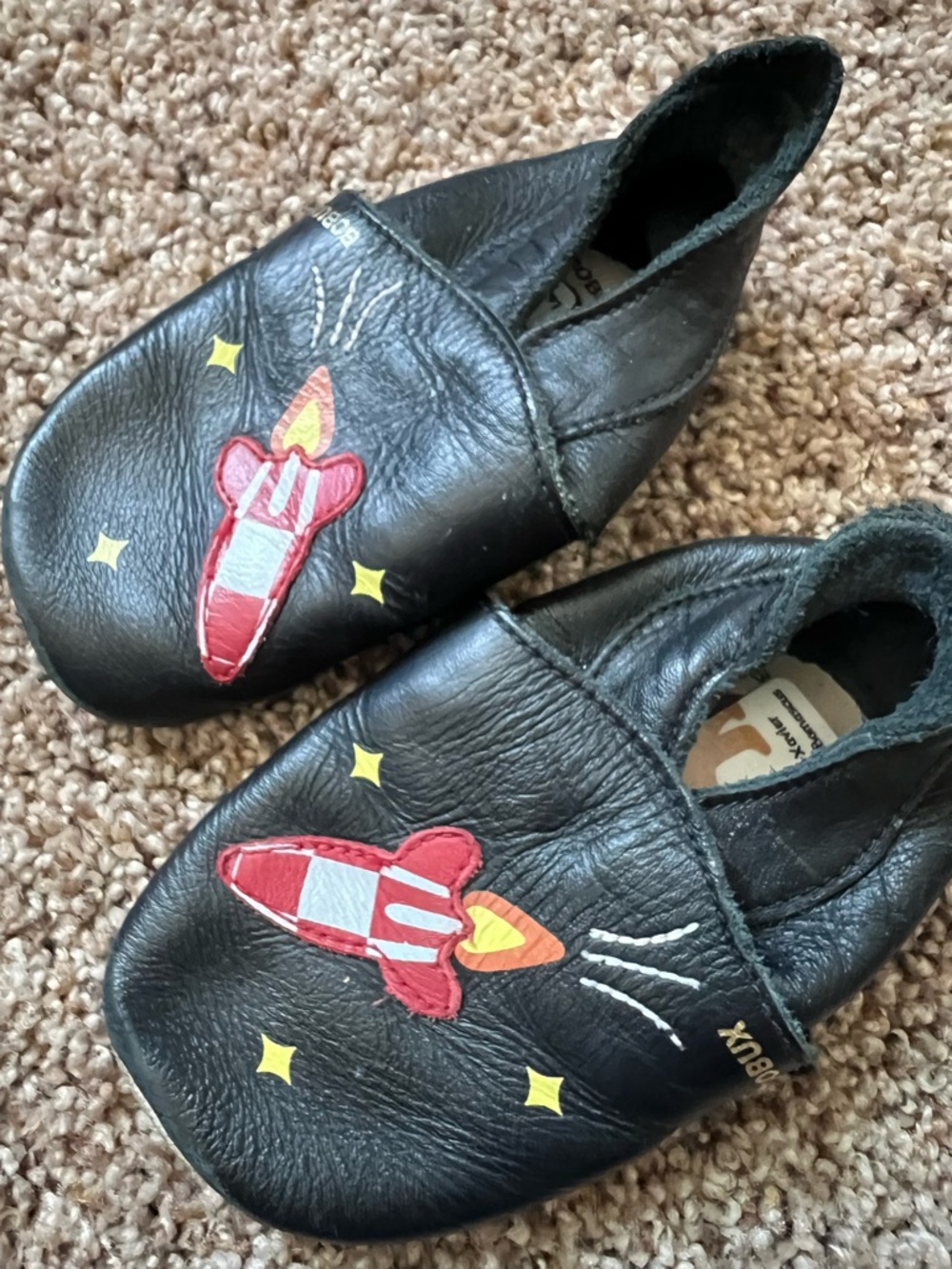 Bobux Black Leather Kids Slip-On Shoes with Red Rocket Applique